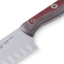 Close-up of the Messermeister Custom Red Kullens Santoku Knife - 7", featuring an ergonomic handle, stainless steel blade with oval kullens, and Messermeister branding.