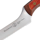 Close-up of a Messermeister Custom Red Scalloped Offset Knife - 8" blade featuring the brand name, logo, and “Solingen, Germany 8644-8” engraved on its serrated edge with a wooden offset handle.