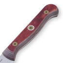 Close-up of the Messermeister Custom Red 4 Piece Steak Knife Set handle, showing reddish-brown wood with two brass rivets and a metal lanyard hole. The partially visible blade highlights this elegant, razor-sharp steak knife collection.