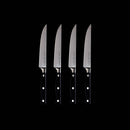 The Messermeister Meridian Elite Fine Edge Steak Knife Set features four identical knives with black handles and silver blades, lined up vertically against a solid black background.