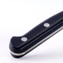 Close-up of the black handle of the Messermeister Meridian Elite Kullens Carving Knife - 8", featuring two metal rivets and a visible metal spine, crafted from German stainless steel. Blade is not shown; set against a white background.
