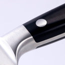 Close-up of the Messermeister Meridian Elite Kullens 8" Carving Knife, featuring a black handle with a silver rivet and a smooth transition to the blade crafted from premium Solingen German stainless steel.