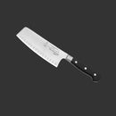 The Messermeister Meridian Elite Kullens Vegetable Knife - 7" features a broad stainless steel blade and a black triple-riveted handle, showcased on a dark gray background.