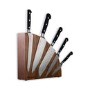 The Messermeister Meridian Elite Magnet Block Set - 6 Piece features five German hand-forged knives with black handles, displayed from largest to smallest in a wooden magnetic block. Brand: Messermeister.