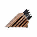 The Messermeister Meridian Elite Next Level 11-piece block set features German stainless steel knives with black handles, neatly arranged in a wooden block by Messermeister.