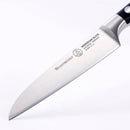 A close-up of a Messermeister Meridian Elite Sheep's Foot Paring Knife - 3.5", featuring a sharp high-carbon stainless steel blade and a black handle, crafted in Solingen, Germany, set against a white background.