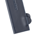 A close-up of the Messermeister Midnight Navy Leather Magnetic Edge-Guard (8.5") shows visible stitching and two rounded tabs peeking out from an open slot.