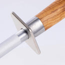 Close-up of a Messermeister Oliva Elite Fine Grit Steel - 10" honing rod, featuring a wooden handle and rectangular metal guard, set against a light background.