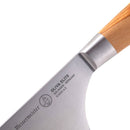 Close-up of the Messermeister Oliva Elite Nakiri Knife - 6.5" with a wooden handle and German-forged blade engraved with “Messermeister,” “OLIVA ELITE,” and “Solingen, Germany”—perfect for prepping vegetables.