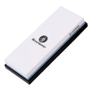 The Messermeister Polishing Stone features dual sides with 2000 and 5000 grit for precise knife sharpening. This rectangular stone comes on a sturdy black base, ideal for achieving a razor-sharp finish.
