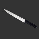 The Messermeister Pro Series Kullens Carving Knife - 10" features a long, narrow high-carbon stainless steel blade and black handle, displayed against a dark gray background.