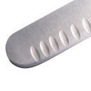 Close-up of the Messermeister Pro Series Round-Tip Kullens Slicer - 12", showing its German stainless steel blade with a rounded tip and oval-shaped indentations along one edge.