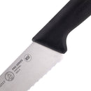 A close-up of the Messermeister Pro Series Scalloped Baker's Knife - 10" shows its black handle and blade labeled "Pro Series," "Portugal," and "NSF." The Messermeister logo on the handle highlights its quality for professional baking.