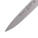 Close-up of the pointed blade of a Messermeister Pro Series Spear Point Paring Knife - 4", crafted from high-quality German stainless steel, with "Messermeister" and product details engraved on its sleek surface.