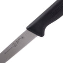Close-up of a Messermeister Pro Series Spear Point Paring Knife - 4" with a black handle and German stainless steel blade, featuring visible Messermeister branding and certification markings on the blade.