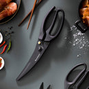 The Messermeister Push Button Take-Apart Poultry Shears - 10" are on a gray countertop, surrounded by shrimp, red and green chili peppers, salt flakes, peppercorns, and chopsticks.