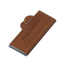 The Messermeister Saddle Brown Leather Magnetic Edge-Guard - 4" features tan stitching and "Messermeister" embossed on the front, displayed against a white background.