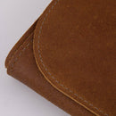 Close-up of the Messermeister Vintage Leather Amber Knife Roll - 7 Pocket, featuring visible edge stitching. Handmade in the Netherlands by Messermeister, showcased on a neutral background.