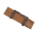 The Messermeister Vintage Leather Amber Knife Roll - 7 Pocket, crafted in brown leather with two dark brown straps and brass buckles, is shown rolled up on a white background.