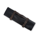 The Messermeister Vintage Leather Black Knife Roll - 7 Pocket features brown straps and buckles, with "Messermeister" embossed on the center strap—a stylish handmade roll for elegant chef knife storage.