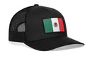The Haka Hat Mexican Flag Trucker Hat in black features a rectangular embroidered Mexico flag patch with the national emblem on the front panel. This stylish Black Mexico Snapback is crafted by Haka Hat.