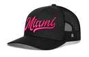 The Haka Hat Miami Hot Pink Script Trucker Hat is a black Florida snapback with "Miami" in hot pink script on the front, featuring a curved brim and breathable mesh back for style and comfort.