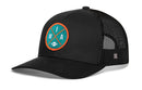 The Haka Hat Miami Trucker Hat is a black mesh snapback with a curved brim, featuring a round teal and orange "MIA" football patch and HAKA signature 5.0 details for an adjustable fit.