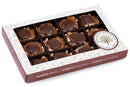 Enjoy the Millican Pecan Dark Chocolate Caramillicans Gift Box—a gourmet collection of twelve decadent chocolate caramel pecan candies, each enveloped in a rich dark chocolate layer. This elegant gift box from Millican Pecan promises treats that are always fresh, always delicious, and always flavorful.