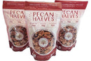 Three upright 5oz Millican Pecan Orchard Fresh Raw Pecan Halves - Premium Shelled Texas Pecans bags are shown, with maroon and white resealable packaging and a clear window revealing the raw pecan halves inside.
