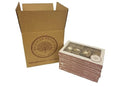 Six boxes of Millican Pecan Combination 3-Chocolate Caramillicans Gift Box are stacked neatly beside an open Millican Pecan shipping box, which prominently features the company logo and website on the front.