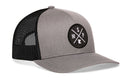 The Haka Hat Minneapolis-St. Paul Trucker Hat | Gray-Black MSP X Snapback features a mesh back and an embroidered MSP patch with crossed lines and state outline—ideal for fans of Minneapolis-St. Paul.