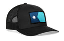 The Haka Hat Minnesota Flag Trucker Hat is a black mesh-back snapback featuring a rectangular patch with a blue and teal design and a white star, inspired by the Minnesota flag.