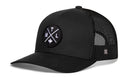 The Haka Hat Montreal Trucker Hat | Black MTL X Snapback features a circular MTL logo patch with a maple leaf and a small HAKA 5.0 H logo on the mesh back, combining style with city pride in a versatile snapback design.