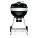 Napoleon PRO22 charcoal kettle grill with adjustable cast iron grates and rotisserie-ready lid