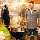 Napoleon PRO22 charcoal kettle grill with adjustable cast iron grates and rotisserie-ready lid