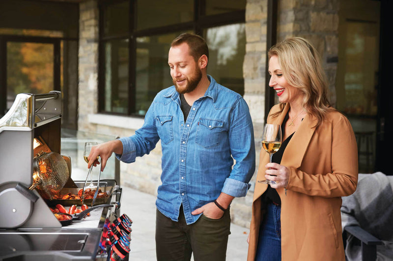 Napoleon Prestige PRO 500 RSIB gas grill with 6 burners, stainless steel body, infrared rear and side burners, and rotisserie kit