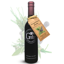 A dark glass bottle with a gold-tagged label reading "Georgetown Olive Oil Co Neapolitan Herbs Balsamic Vinegar," crafted in the traditional style of aged balsamic vinegar from Modena, Italy. The backdrop highlights aromatic herbs and a mortar and pestle, while the label displays the Georgetown Olive Oil Co. brand and Washington, DC 20007.