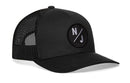 The Haka Hat New Jersey Trucker Hat is a black snapback with a mesh back and a front patch showing white N and J letters separated by a slash.
