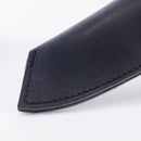 Close-up of the tip of the Messermeister Leather Belt Sheath for Overland Utility Knife, featuring visible edge stitching, shown against a plain white background.