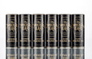 Six black-and-gold tins of The Immaculate Beard’s Conditioning Natural Beard Oil—each showcasing a unique scent: Daybreak, Sunrise, Bright, Noon, Dusk, and Dark—stand in a row on a reflective surface. This premium collection from The Immaculate Beard not only conditions but also acts as a natural beard balm to nourish and style your beard with refined distinction.