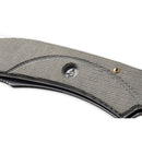 Close-up of the Messermeister Ojai Damasteel Folder - 3.75" handle showcasing its textured gray material, small circular logo indentation, and brass-colored screw—an ideal everyday carry knife from Messermeister.