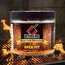 Butcher BBQ Original Pork injection marinade jar on a grill with flames