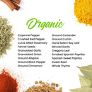 A display of The Spice Lab Organic Starter Spice Set - 18 Jars, featuring USDA Certified Organic spices and herbs arranged on a white background, surrounded by vibrant spice powders, cinnamon sticks, and bay leaves. “Organic” is written in green at the top center. This set by The Spice Lab is perfect for everyday cooking or as an Organic Starter Spice Set.
