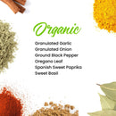 Surrounded by a colorful array of spices, a white center highlights the included organic varieties in The Spice Lab Organic Starter Spice Set – Granulated Garlic, Granulated Onion, Ground Black Pepper, Oregano Leaf, Spanish Sweet Paprika, and Sweet Basil—making it the perfect everyday cooking set from The Spice Lab.