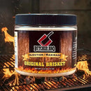 Butcher BBQ Original Pork injection marinade jar on a grill with flames
