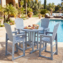 A round, light-blue outdoor table sits poolside on stone, paired with four DirectDeals Outdoor Bar Stool 29″ Height with Backrest and Armrests holding snacks and drinks amid lush greenery and blooms.