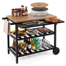 The DirectDeals Outdoor Dining Cart with BBQ Grill and Folding Side Panel includes spices, sauces, utensils, meats, fruits, drinks, and plates—everything neatly arranged for your next barbecue gathering.
