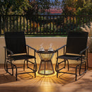 Two DirectDeals Outdoor Glider Chair with Metal Frame and Armrests face each other on a patio, with a round lit table and two steaming cups between them, framed by a black railing and evening trees.