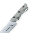A close-up of the Messermeister Overland Chef Slicer - 9" shows its textured grey handle with two metal rivets and a high-carbon stainless steel blade engraved with the Messermeister logo.