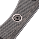 Close-up of the textured gray handle and star-shaped screw on the Messermeister Overland Chef Utility Knife - 4.5", crafted from nitro cobalt steel.